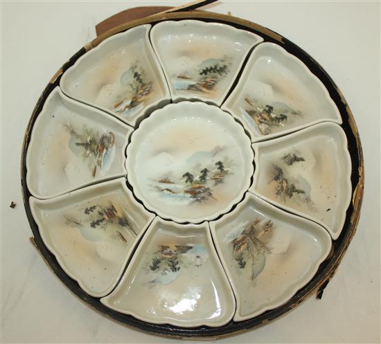 A Japanese lacquered boxed porcelain supper set, c.1900, total diam.31.5cm